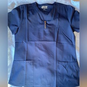 Size medium scrub top. Never worn. Navy blue.